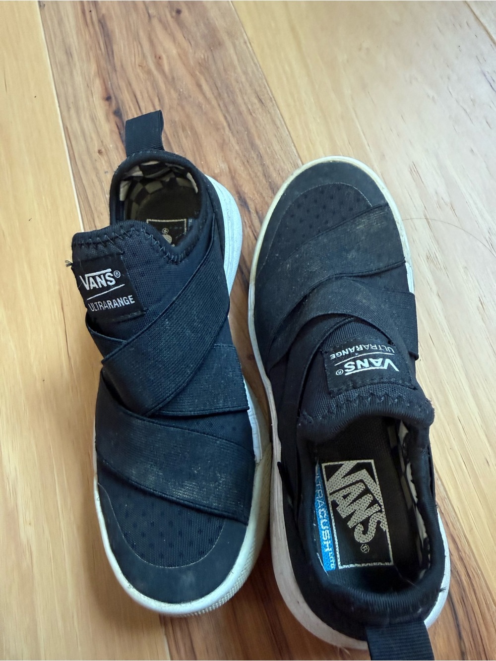 Vans UltraRange Slip-On Sneakers in Black and White